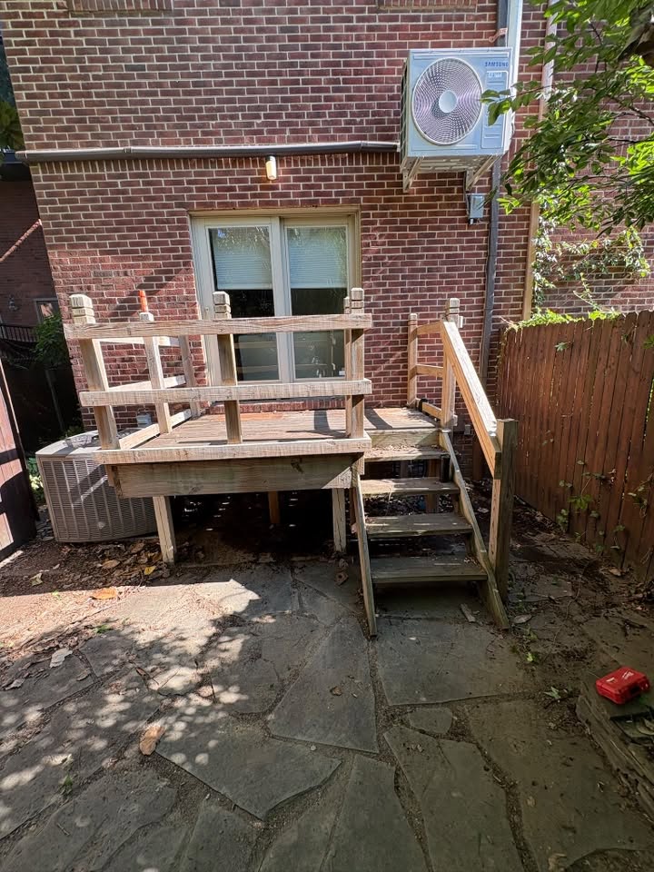 Weathered backyard deck before renovation